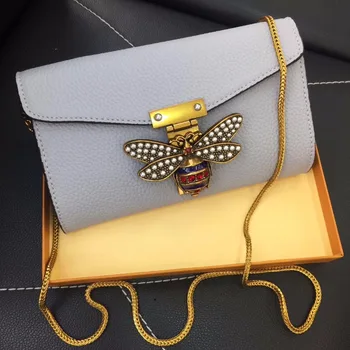 Nahast ümbrik-kott Pearl teenetemärgi mini kott Litši mustriga õlakott Unikaalne mesilaste metallist käekott